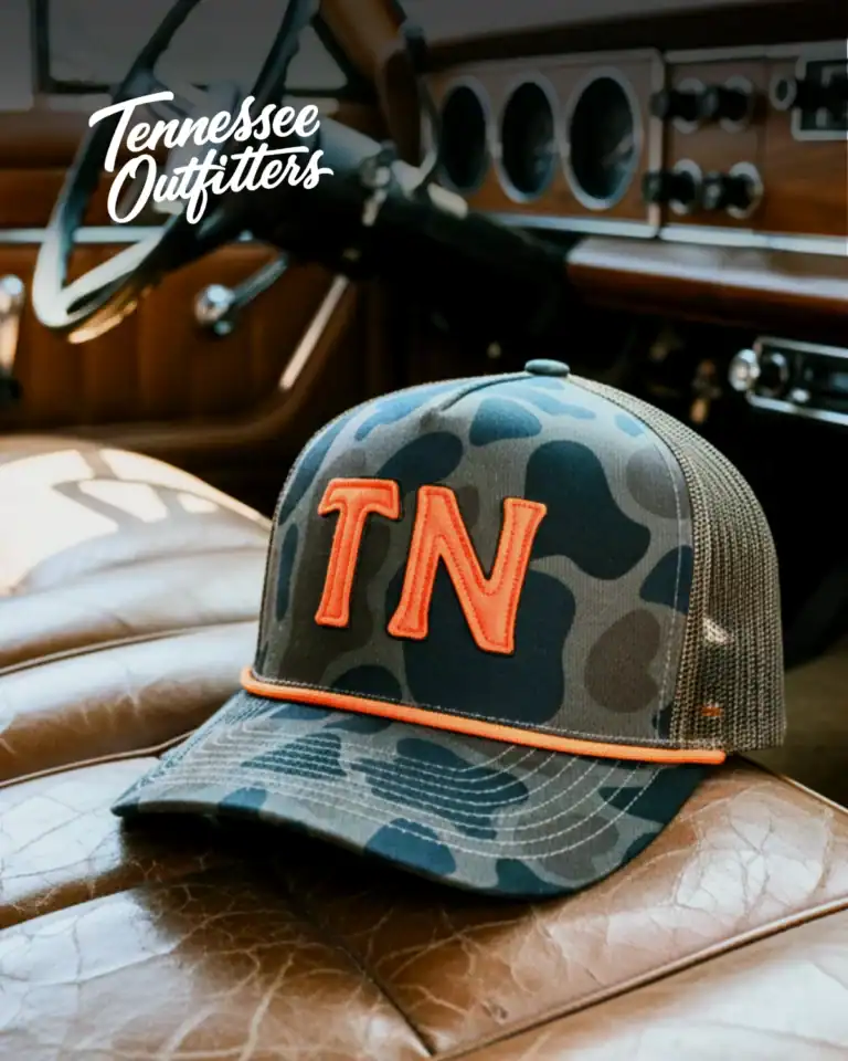Tennessee Outfitters ad: camo TN trucker hat on a vintage truck seat